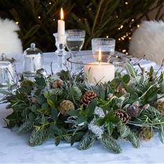 Table wreath with vase and candle centre