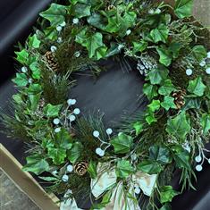 Artificial beige bow wreath 